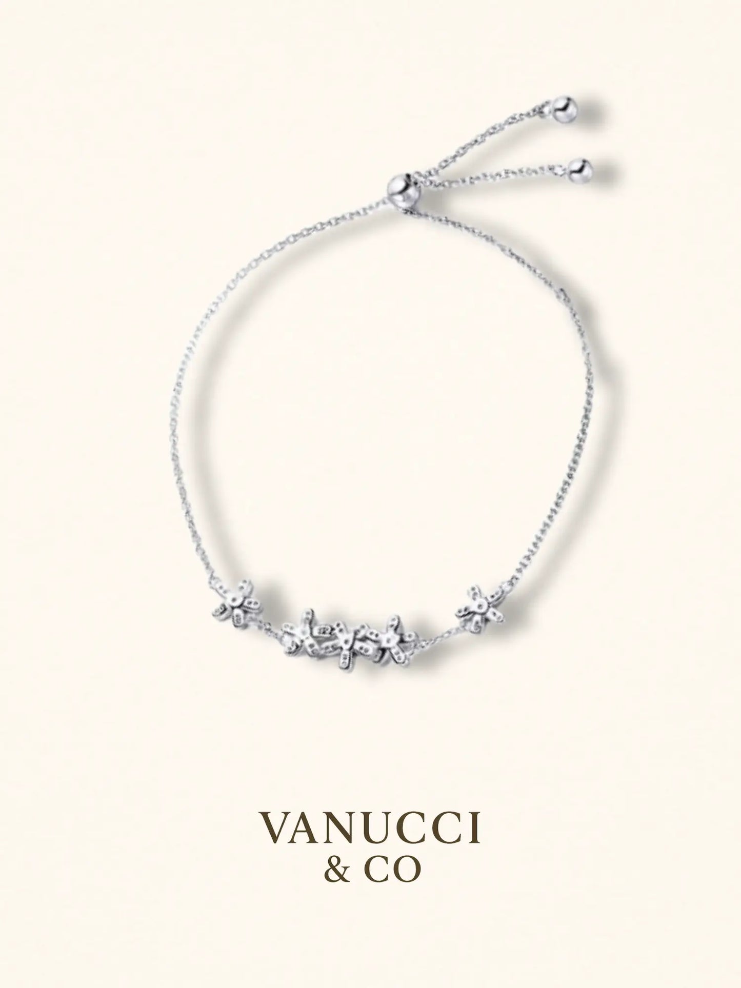 Pulsera margaritas circonias blancas centro - VANUCCI & CO